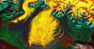 Satellite image of Malaspina Glacier in Alaska shows the formation in bright yellow.